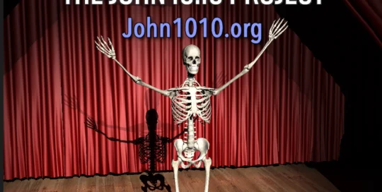 computer generated image of a human skeleton on a theatrical stage